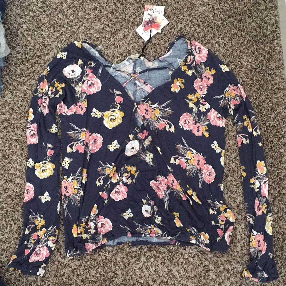 Long sleeve floral blouse.
